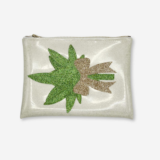 A sparkling white glitter vinyl clutch featuring a green cannabis leaf with a gold glitter bow design. Designed by Kush Kards in collaboration with Julie Mollo, this full-size stash bag is perfect for holding wedding-day essentials like lighters, rolling papers, and pre-rolls.