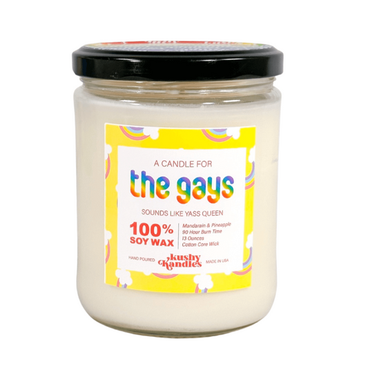 "Vibrant 'The Gays Kush Candle' with mandarin and island pineapple scents, celebrating LGBTQ+ pride and diversity."