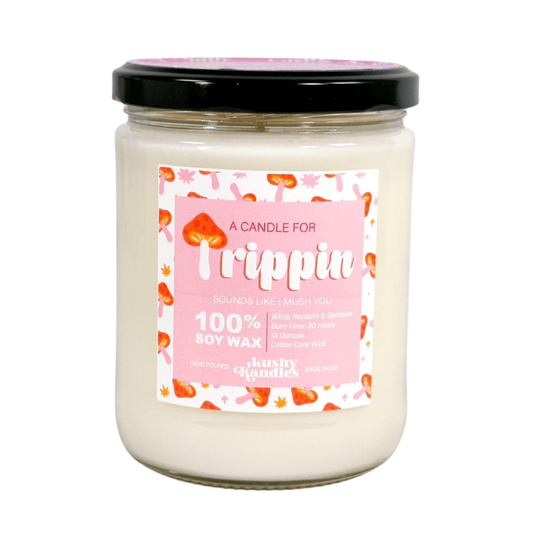 Aromatic Trippin Kush Candle with white nectarine, gardenia, bergamot, and orange scents, ideal for a relaxing and refreshing atmosphere.