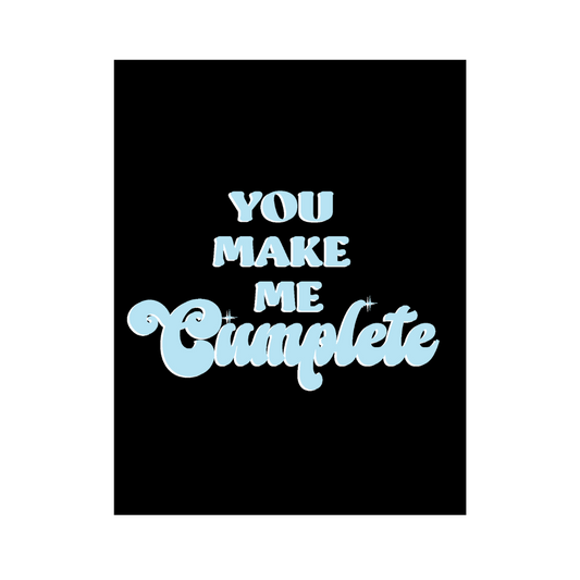 An elegant black greeting card with light blue text stating 'You Make Me Cumplete,' conveying a heartfelt and naughty message.