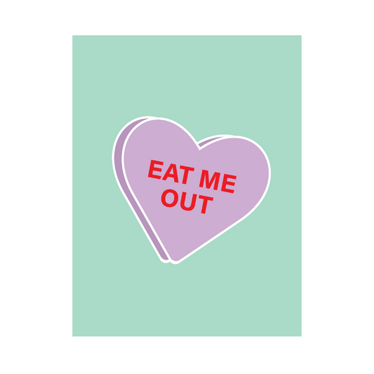 A charming sage-colored greeting card featuring a purple candy heart with the phrase 'Eat Me Out' in bold, playful lettering, evoking a sweet and cheeky sentiment."