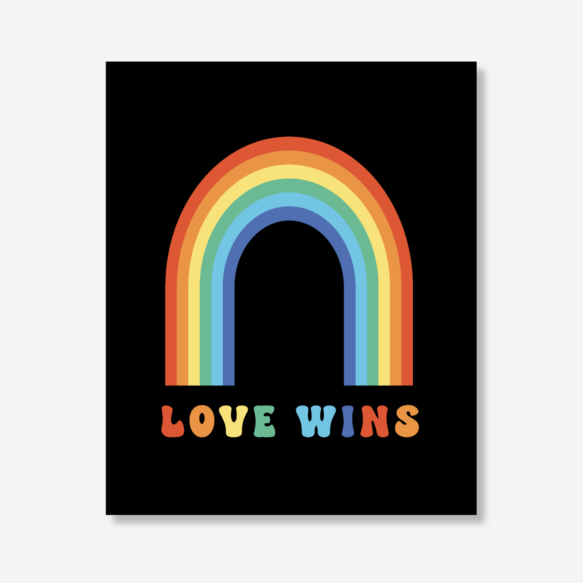 Love Wins LGBTQ+ Pride Greeting Card on 100% post-consumer recycled paper featuring a colorful rainbow with bold, friendly typography.