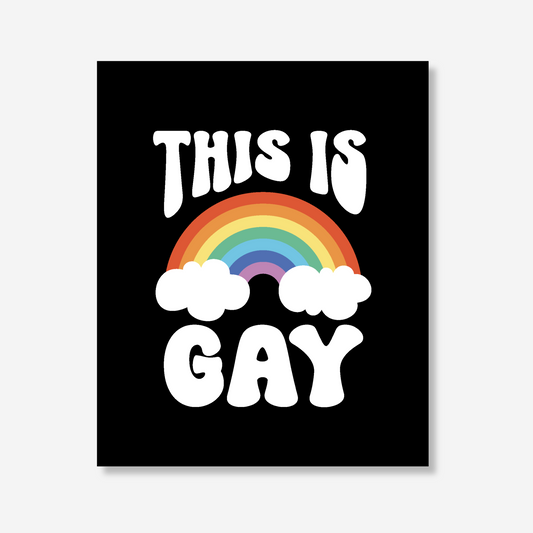 Bold 'This Is Gay' LGBTQ+ Pride Greeting Card with a bright rainbow and clouds, printed on eco-friendly 100% post-consumer recycled paper.