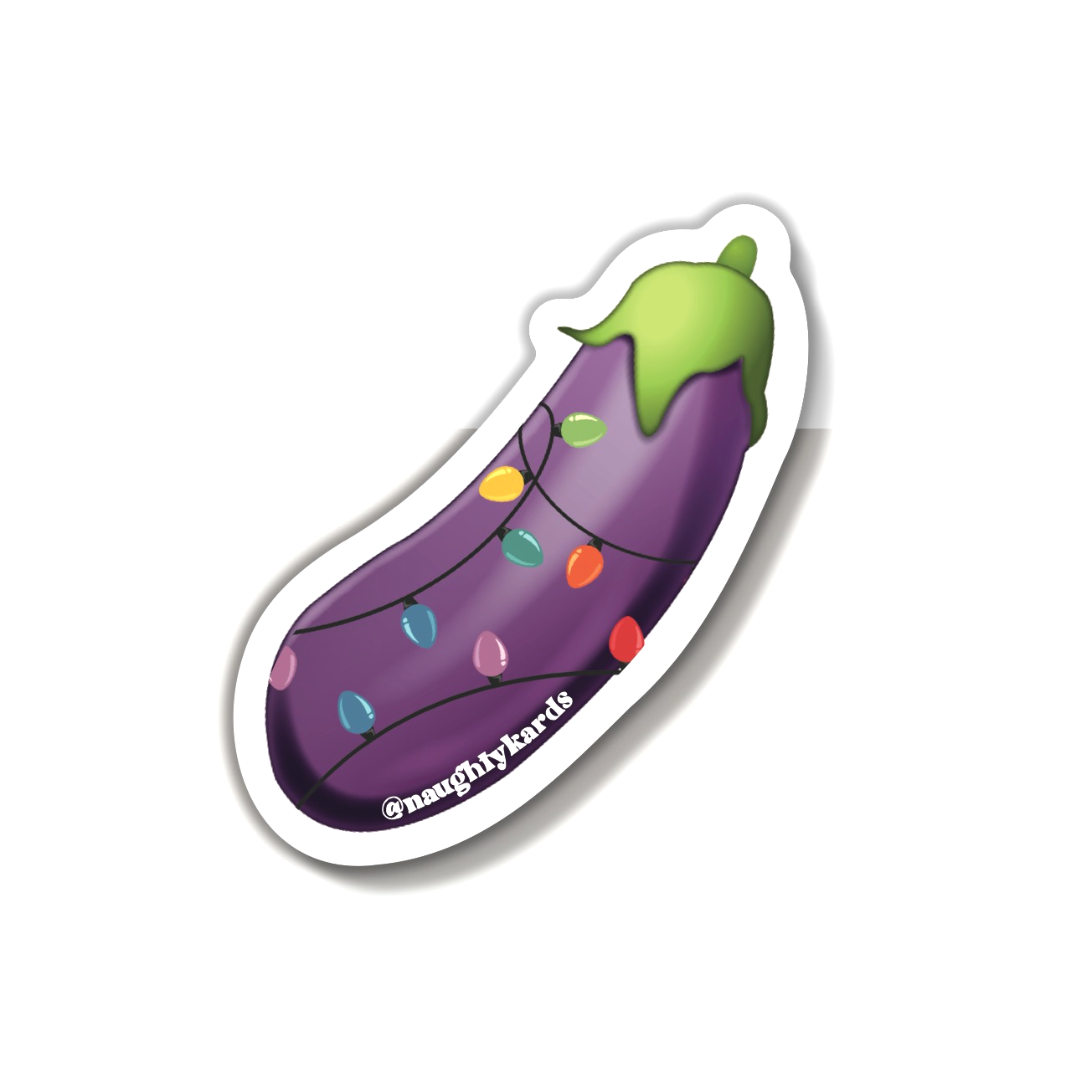 "Festive eggplant emoji sticker wrapped in Christmas lights, adding a fun and suggestive holiday flair to decorations and gifts."