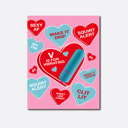 A playful and suggestive greeting card with a pink background, decorated with various candy hearts in shades of blue and red, each featuring flirty and provocative phrases. A large heart in the center displays a blue vibrator with the text 'V is for Vibrating'.