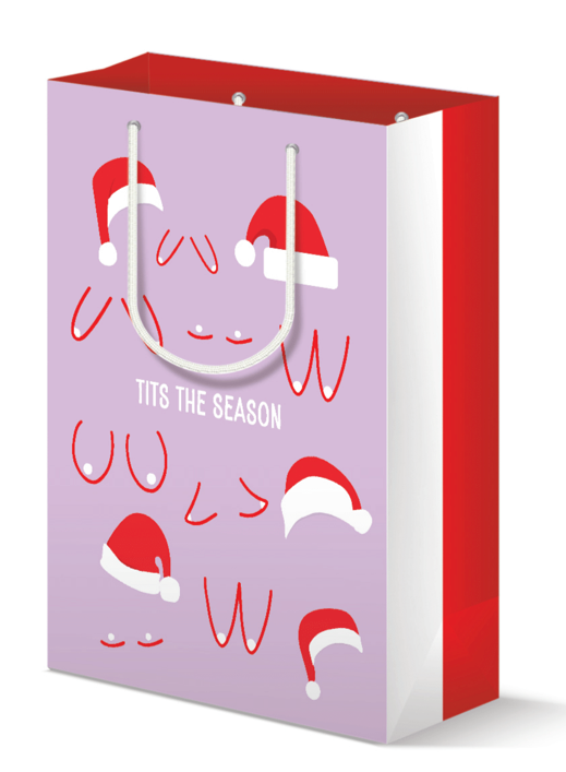 Large lavender holiday gift bag adorned with playful illustrations of santa hats resting on breasts, accompanied by the cheeky text 'TITS THE SEASON'.